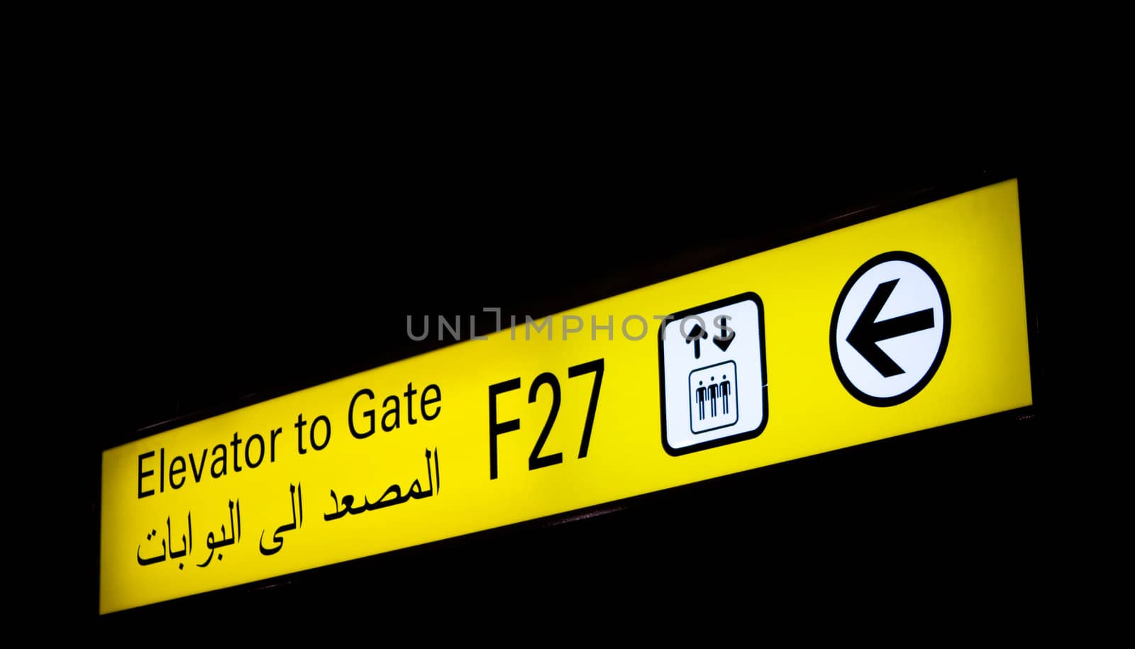 Gate sign in an international airport in Middle East with Arabic information