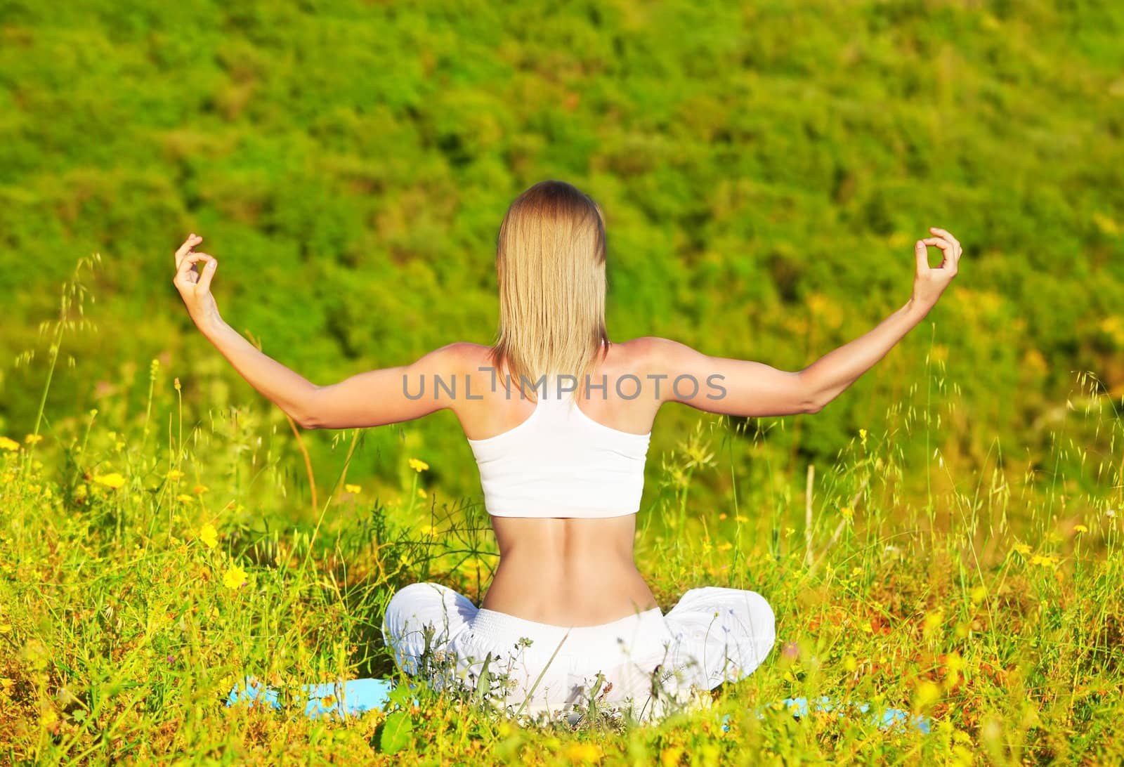 Healthy female doing yoga by Anna_Omelchenko