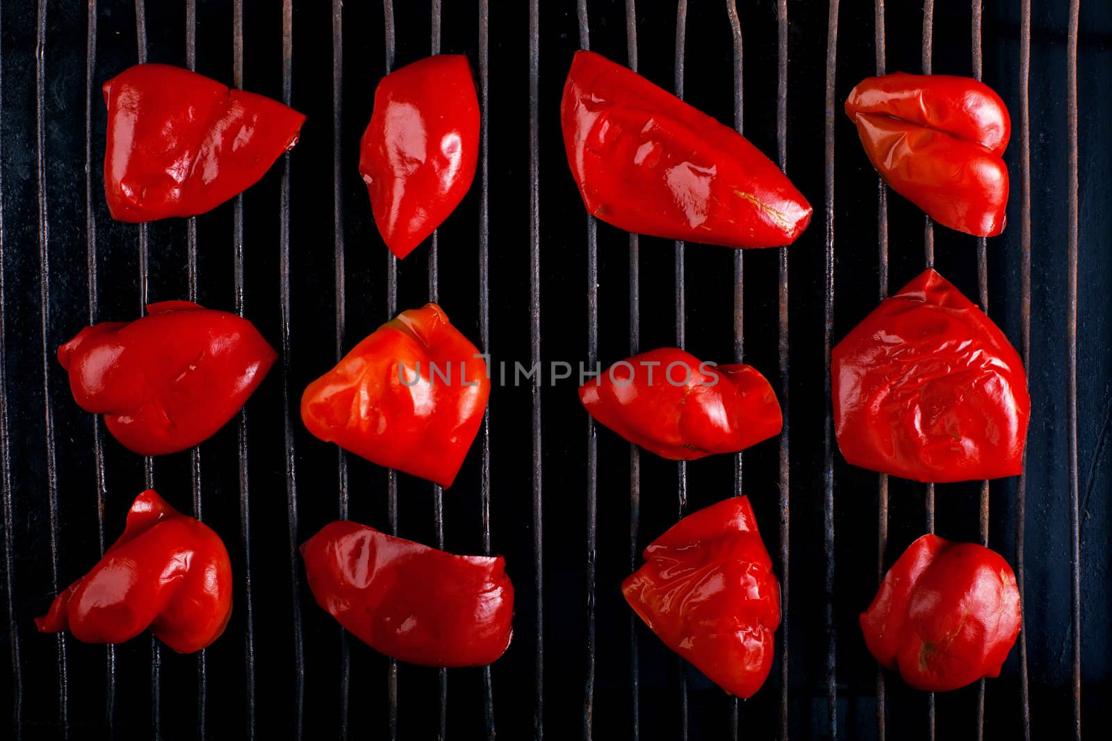 Grilled red pepper on grill