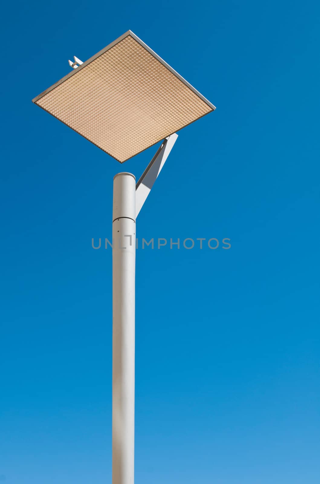 urban and modern lamp post (against a gorgeous blue sky background)
