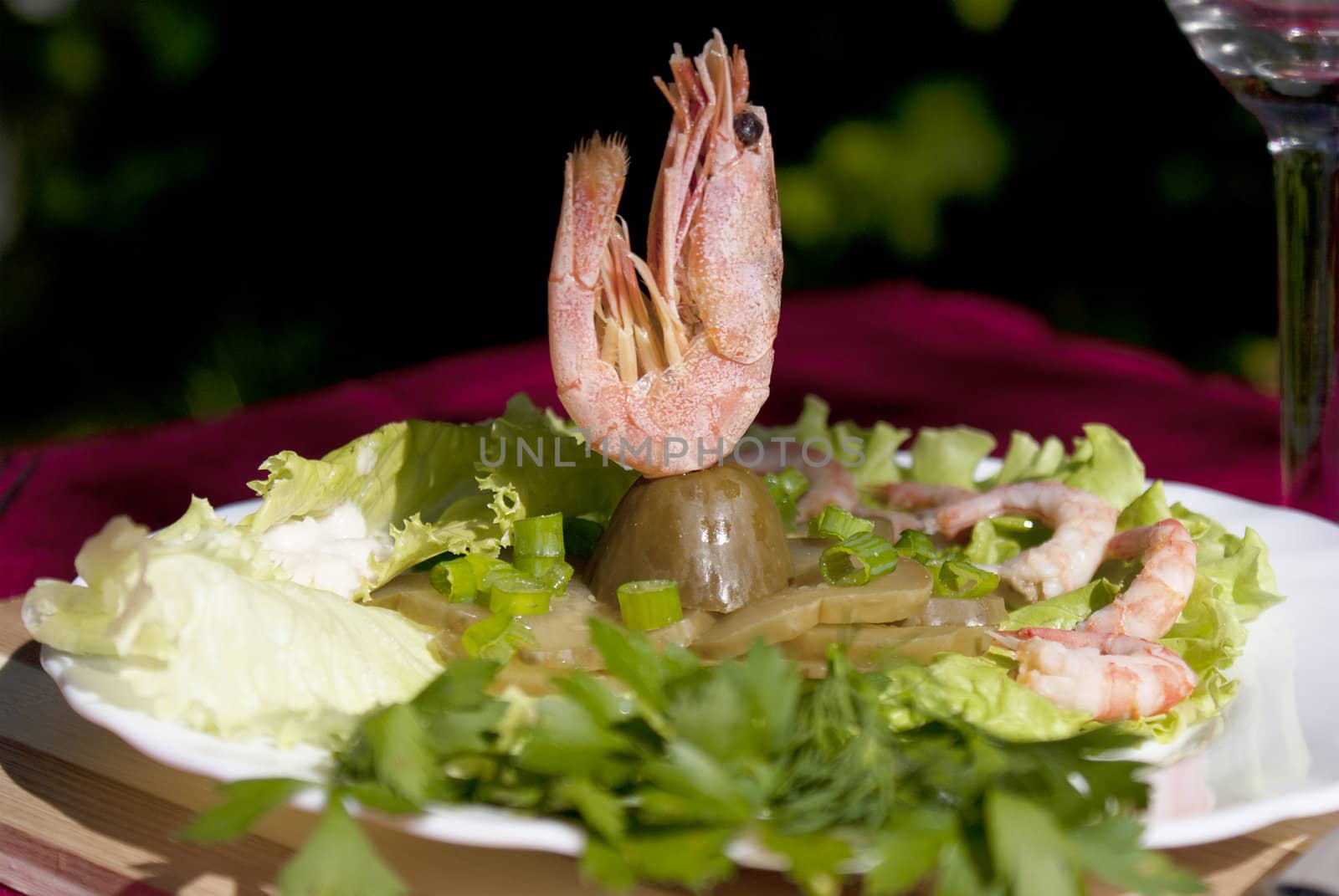 Easy snack from seafood and a marinaded cucumber with a sharp horse-radish