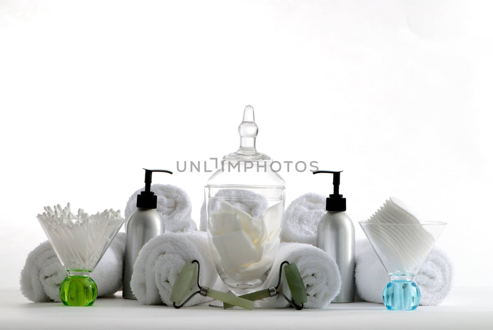 Various professional spa products arranged on a white background