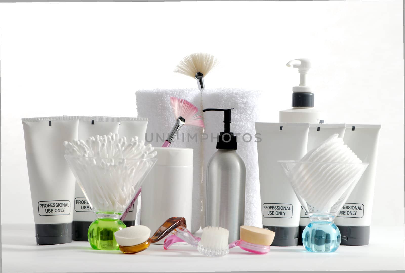 Various professional spa products arranged on a white background