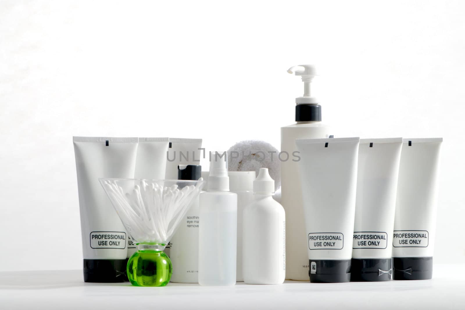 Various professional spa products arranged on a white background