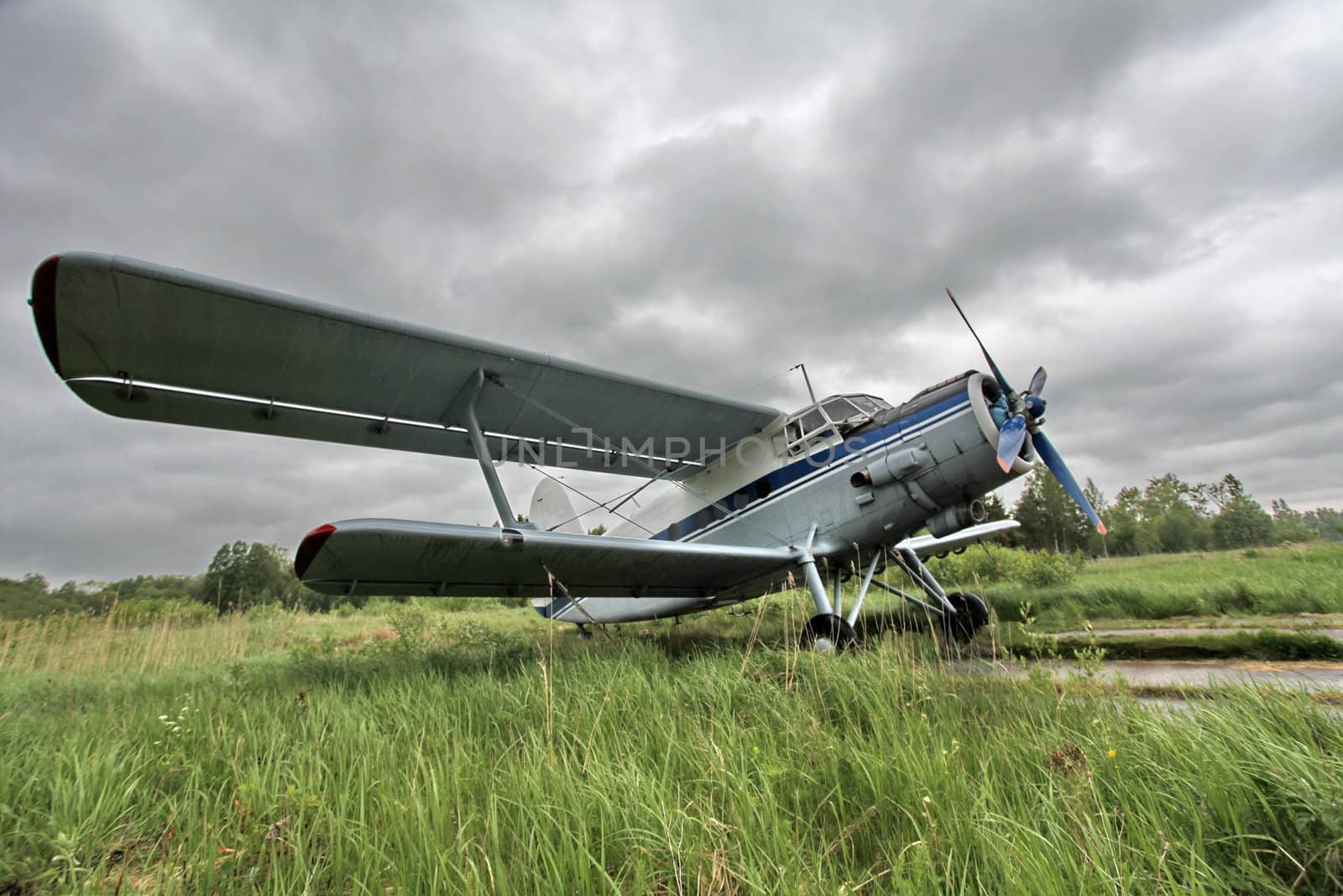 Biplane on the airfield side view