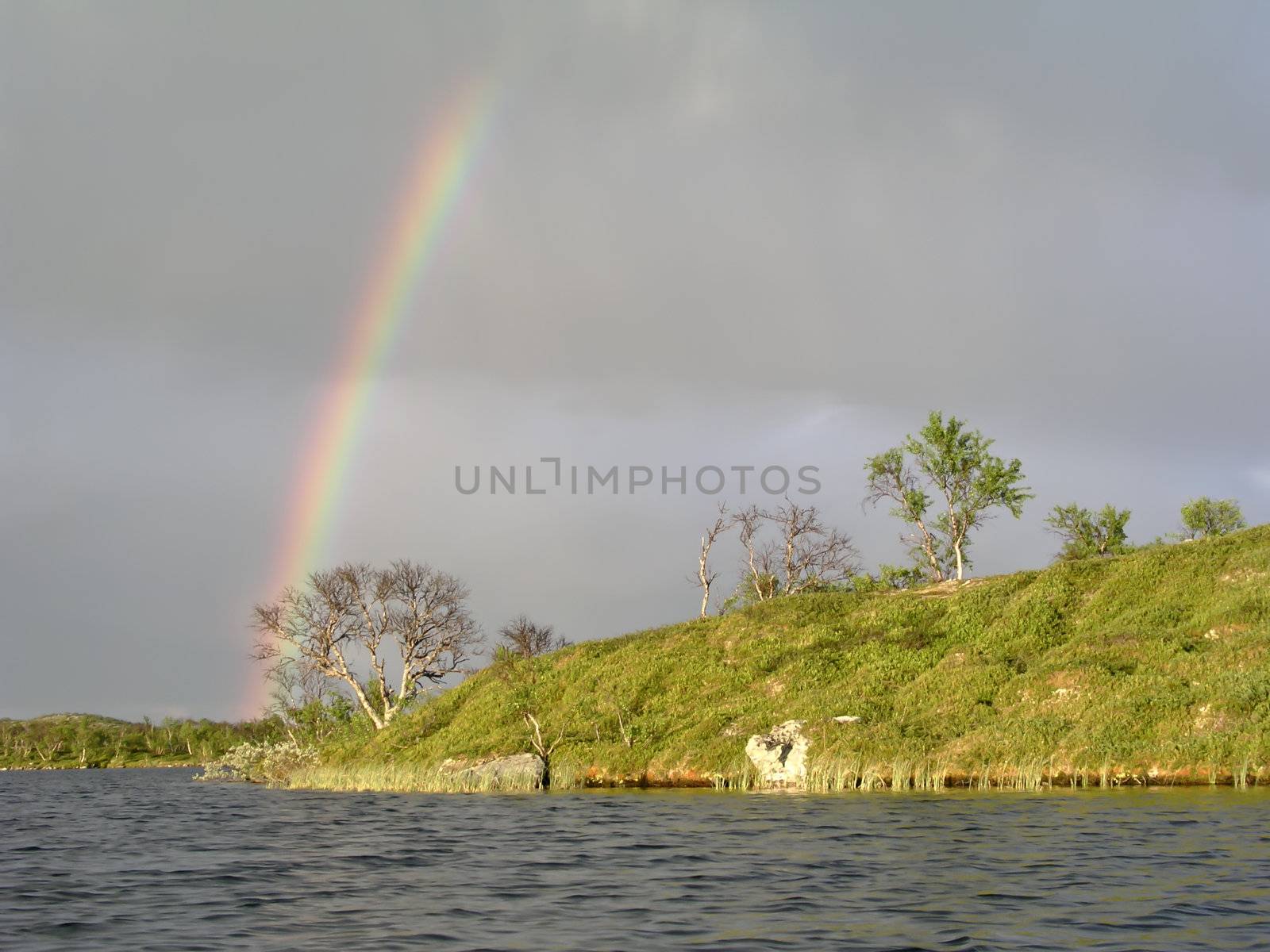 Beautiful landscape of rainbow and lake