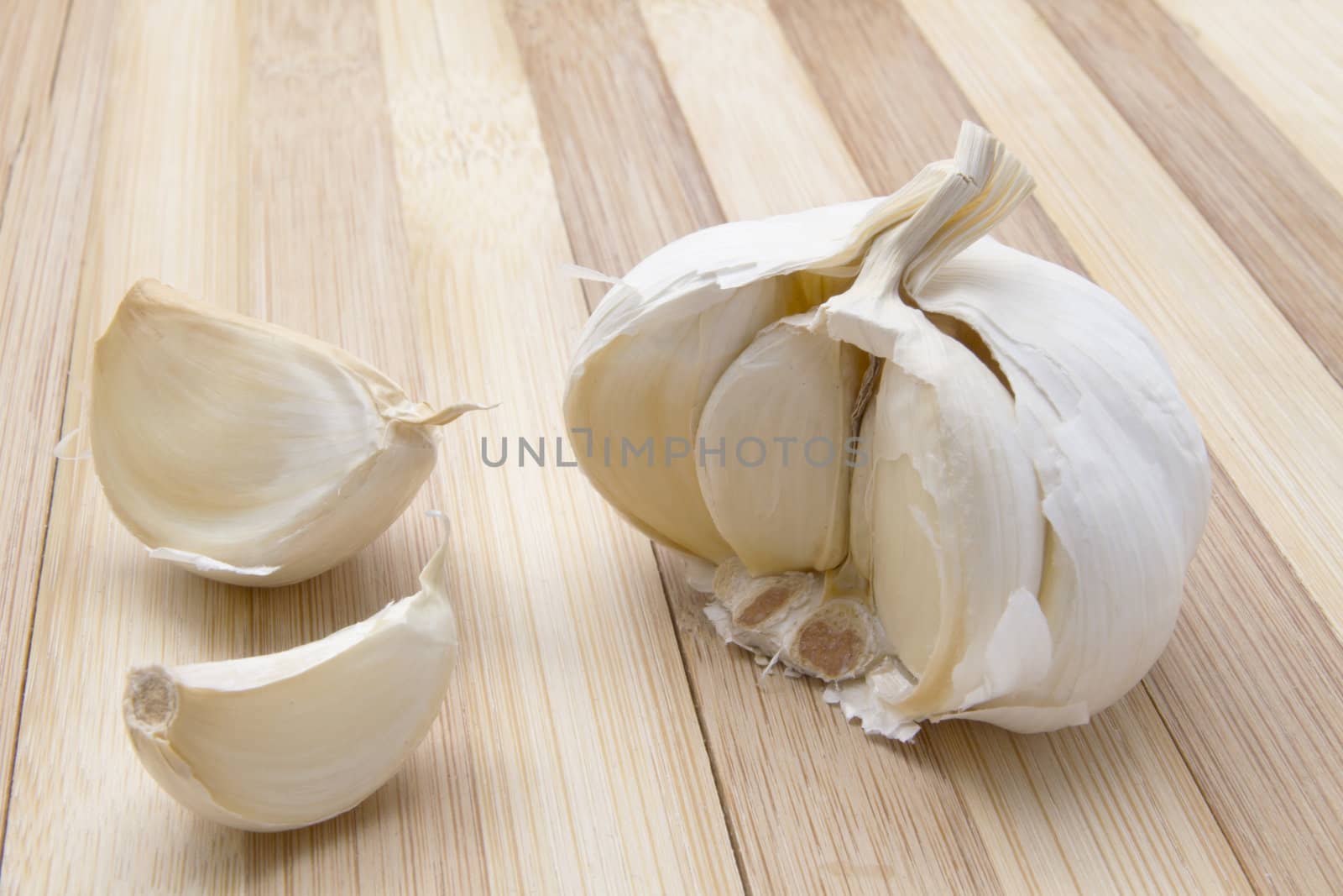 Garlic closeup on wood background