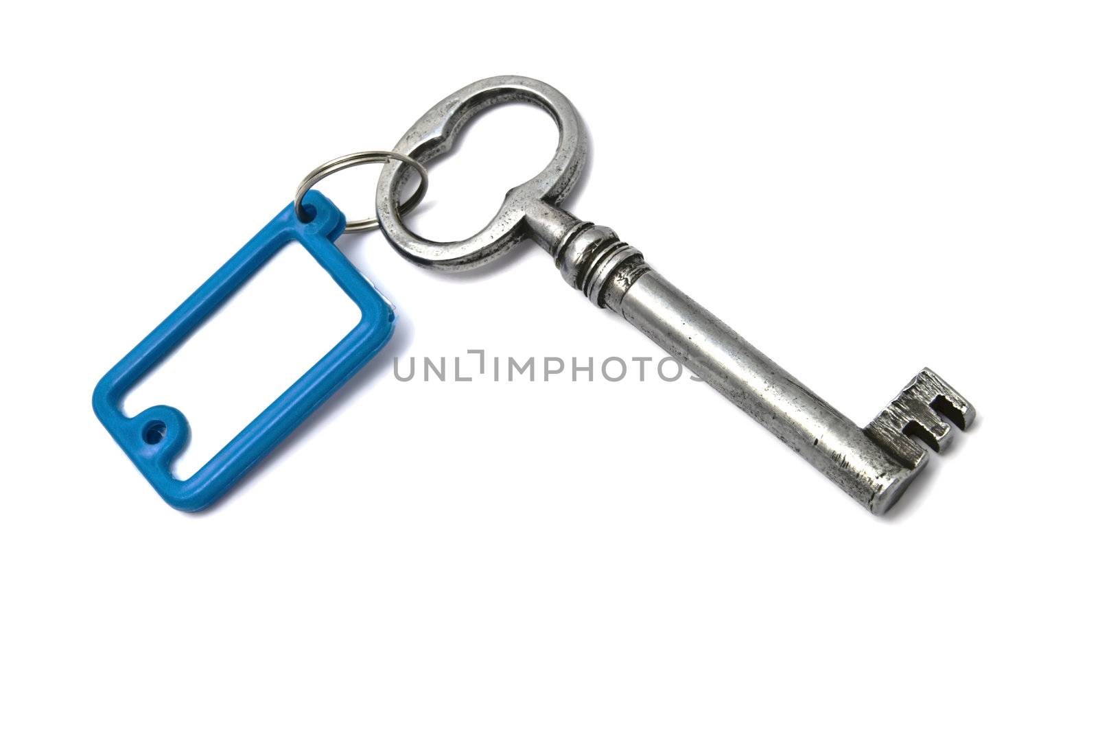 Blank tag and old key isolated on white background 
