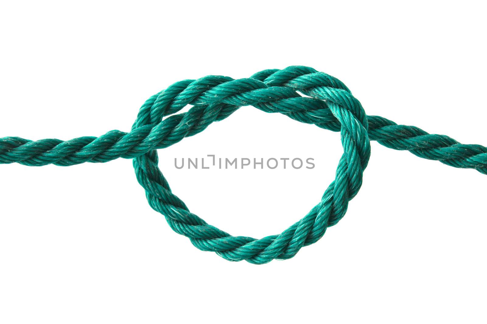 A rope with a heart shape knot closeup on white background
