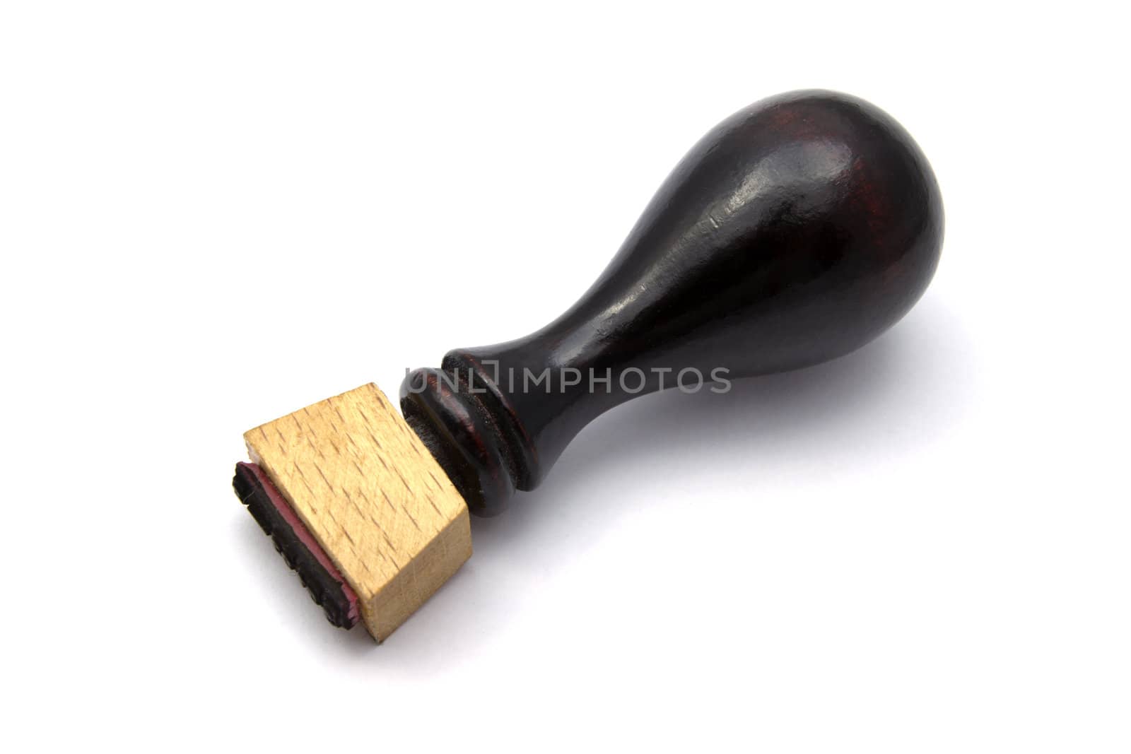 Old wooden stamp isolated on white background 
