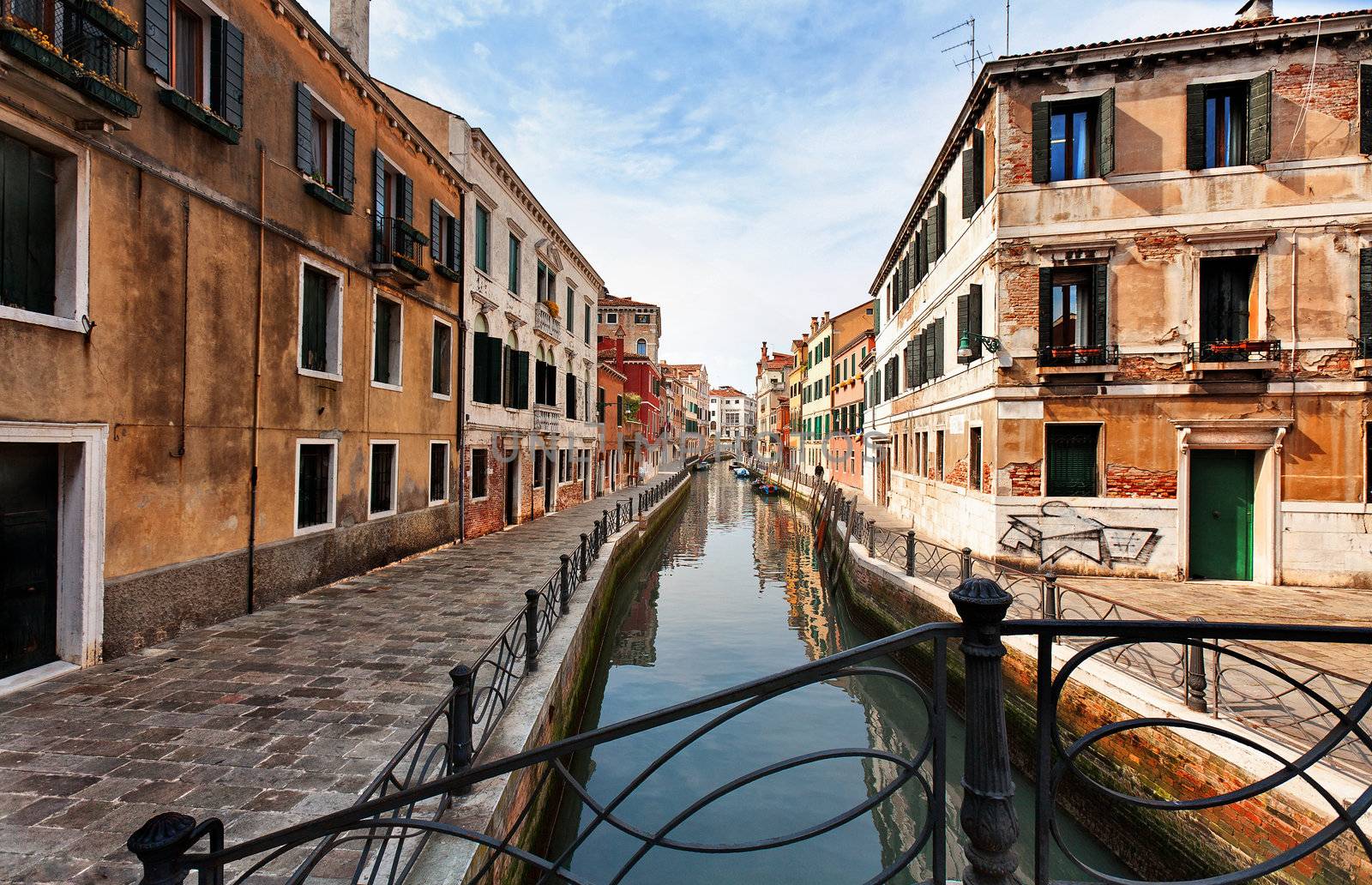 Venice. Venetian canal. Venice is a city in northeast Italy which is renowned for the beauty of its setting, its architecture and its artworks. It is the capital of the Veneto region.