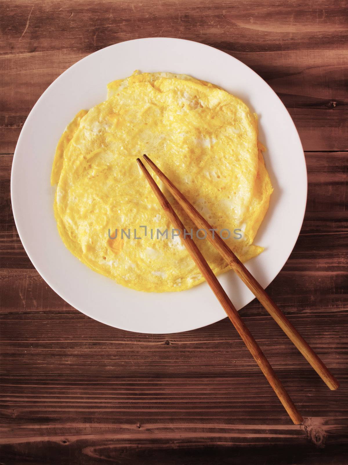 close up of a plate of fried egg omelettes