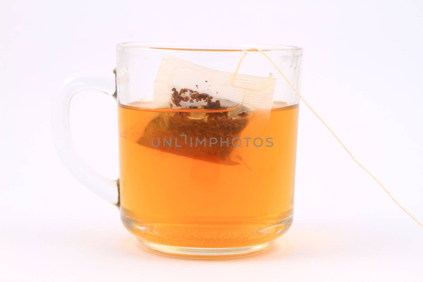 Cup of green tea isolated on white