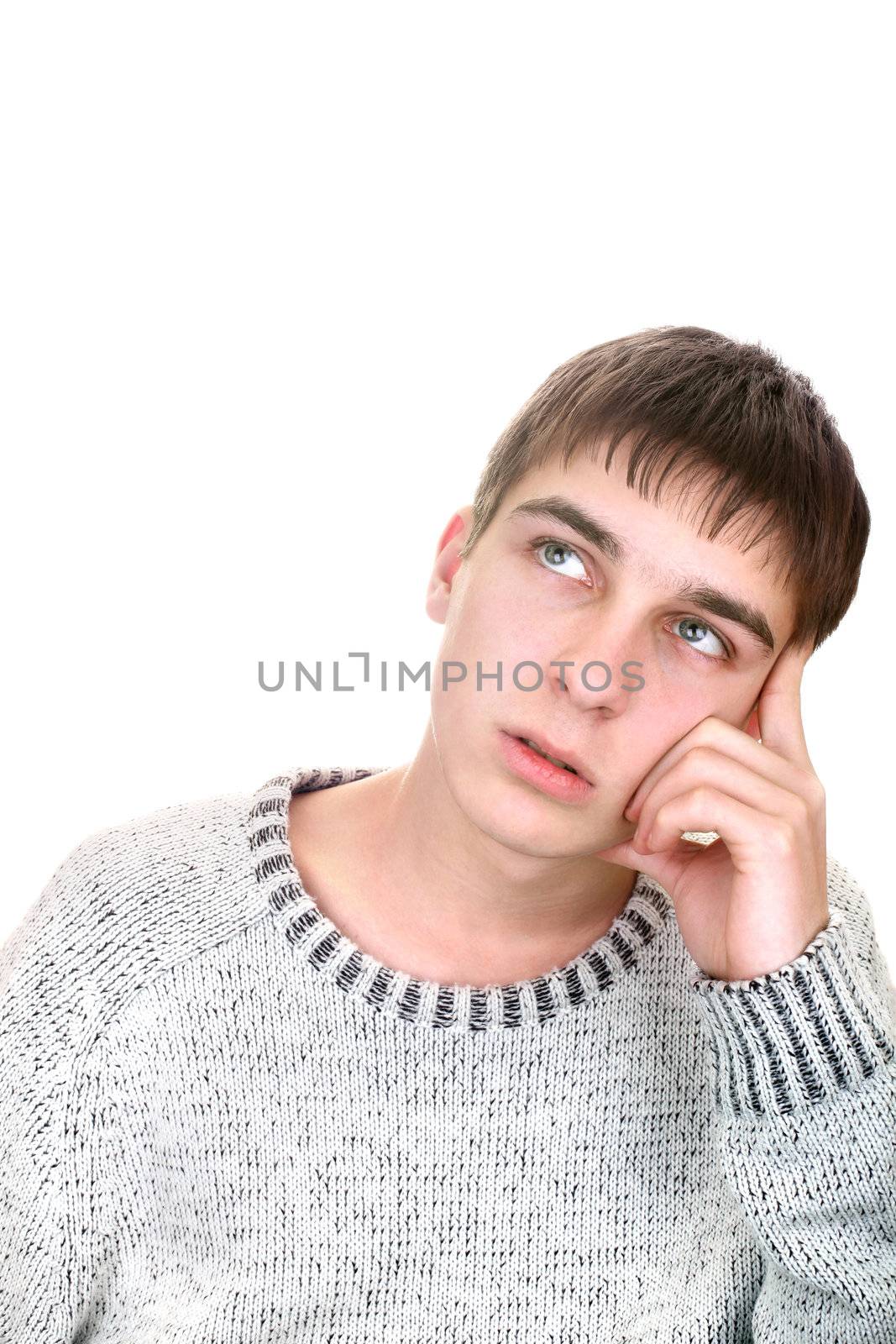 young man is thinking isolated on the white
