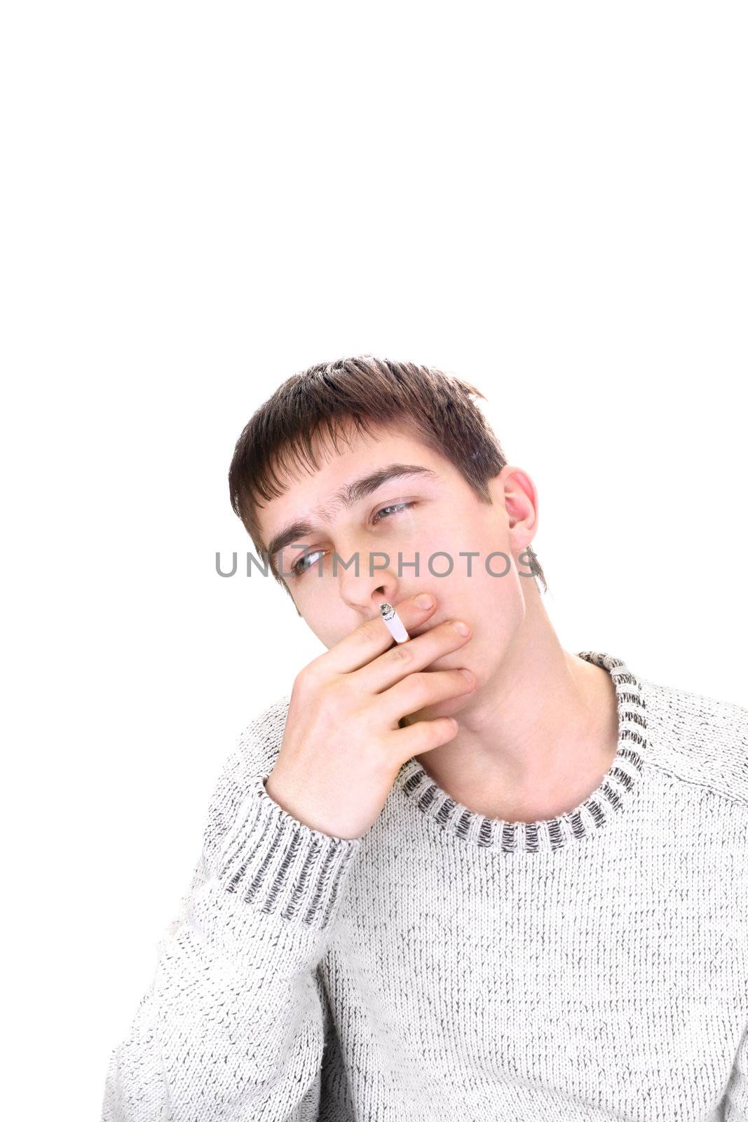 young man is smoking cigarette. isolated on the white background