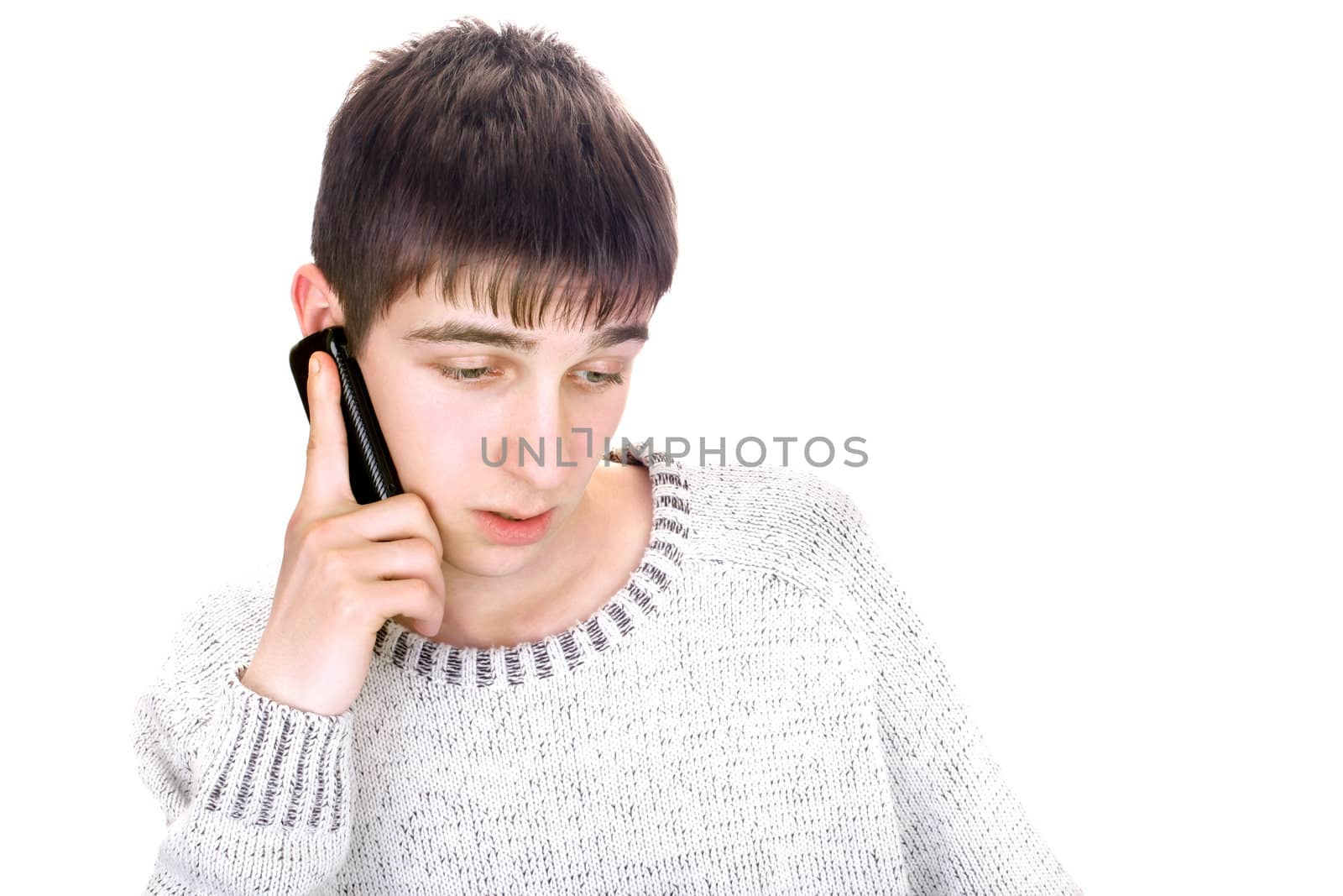 dissatisfied young man with mobile phone isolated on the white background