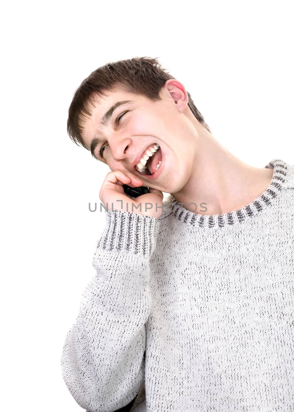 happy young man with mobile phone isolated on the white background