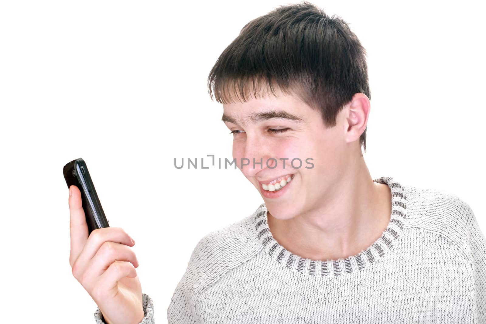 young man look on mobile phone isolated on the white background