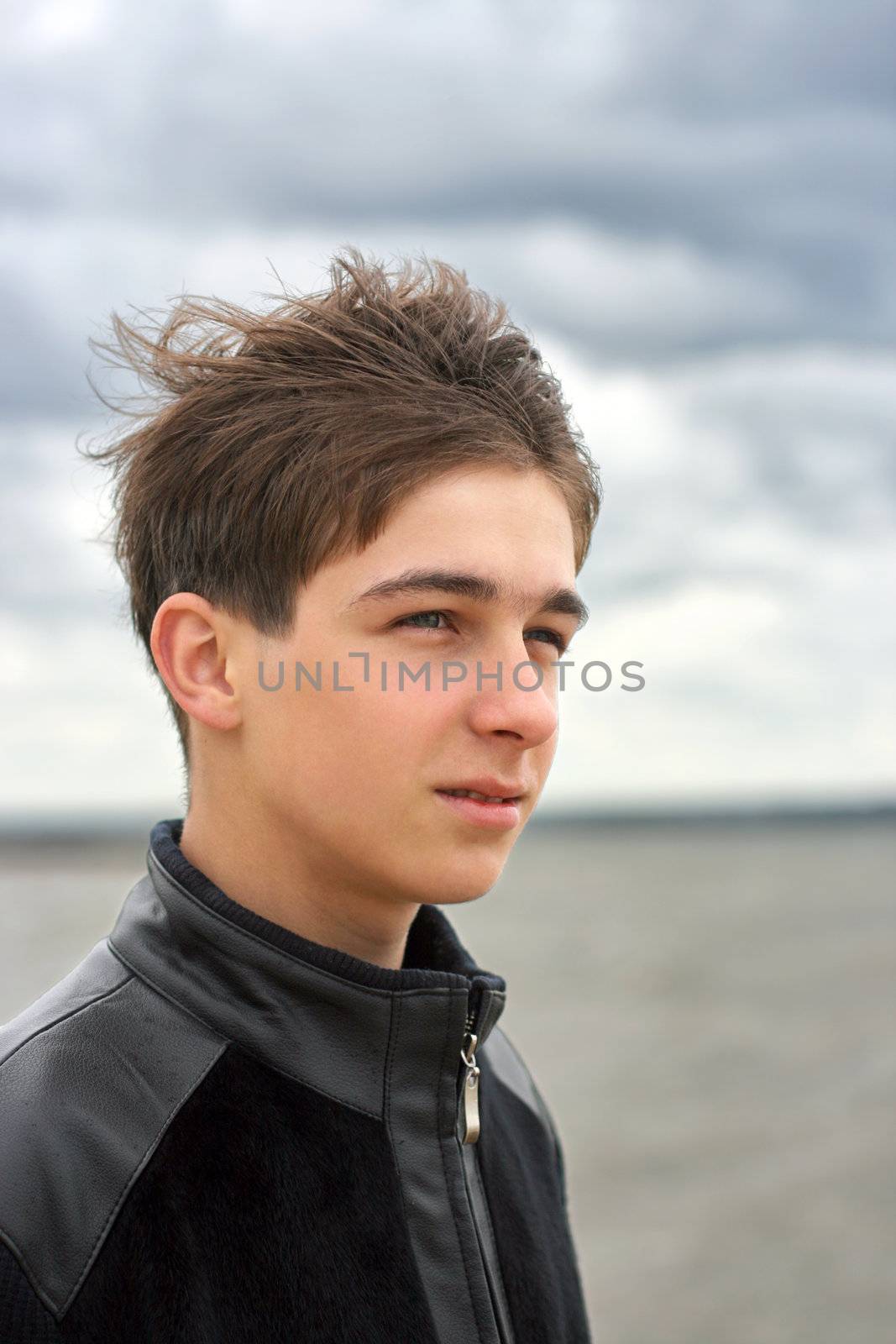 teenager at seaside by sabphoto