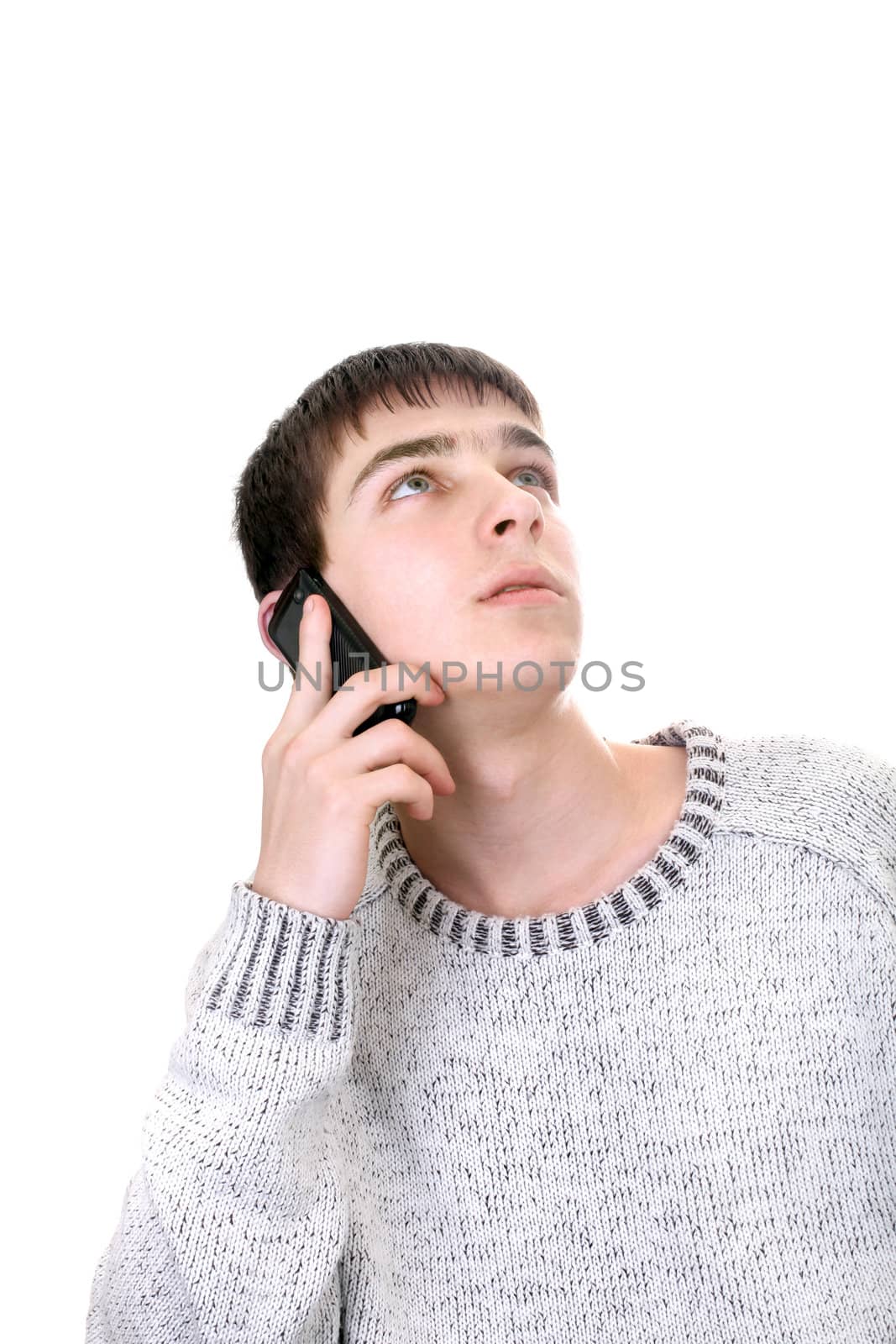 young man with mobile phone isolated on the white background