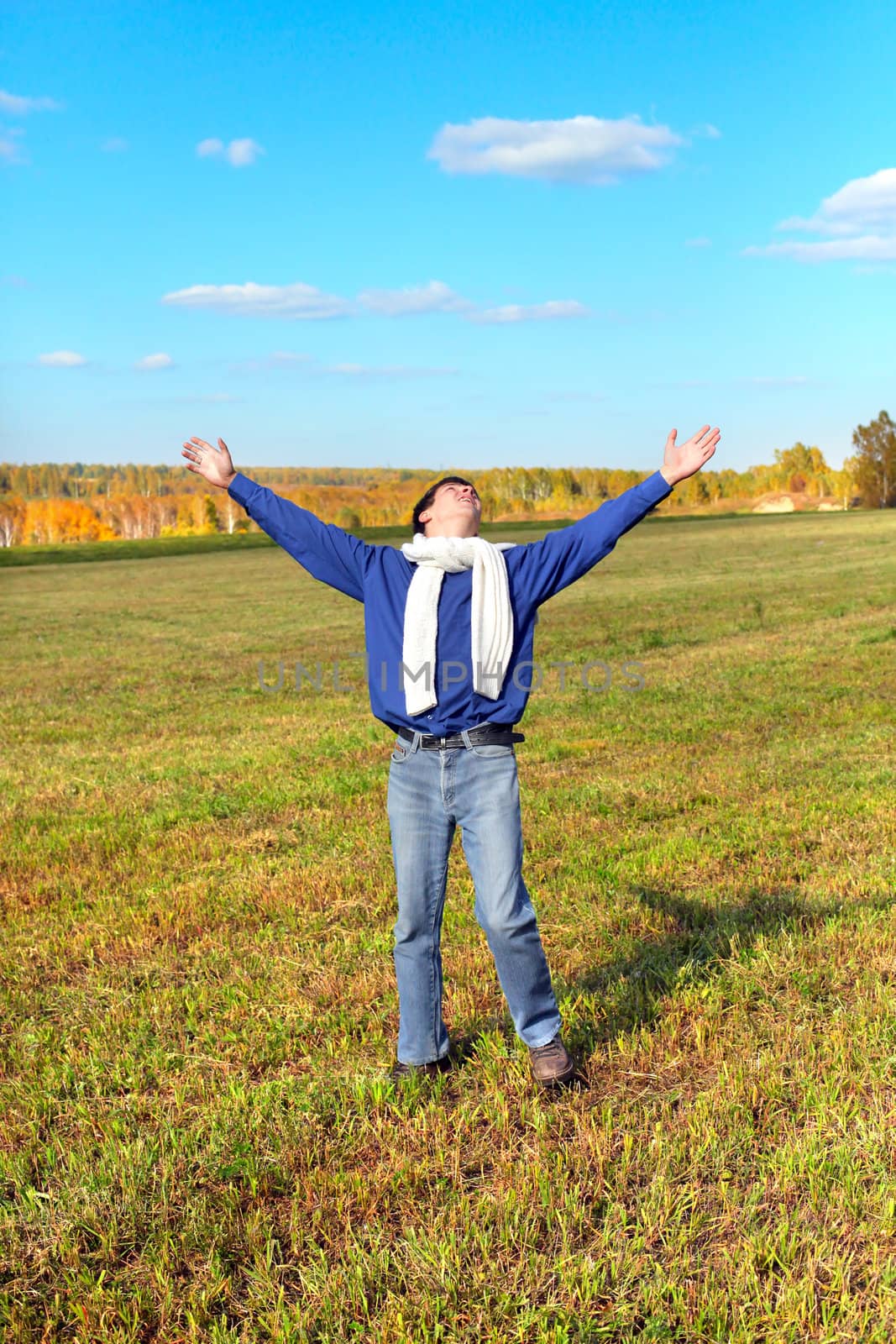 young man in the field by sabphoto