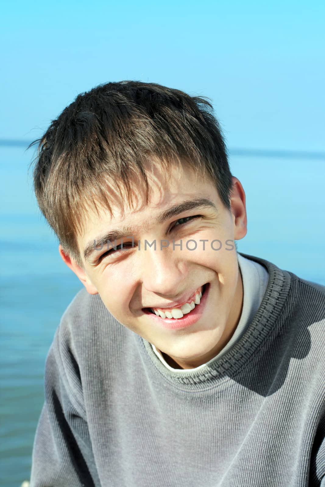 happy teenager portrait at the seaside