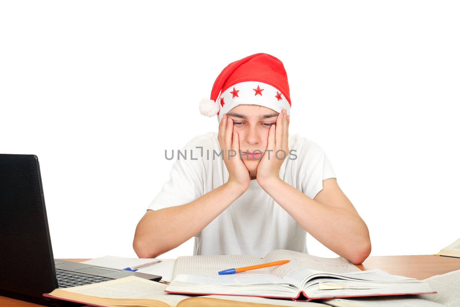 bored and tired student in santa's hat. isolated on the white background