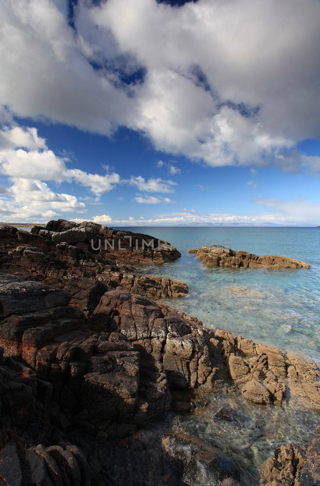 Beach on Gailoch peninsular over looking isle of skye