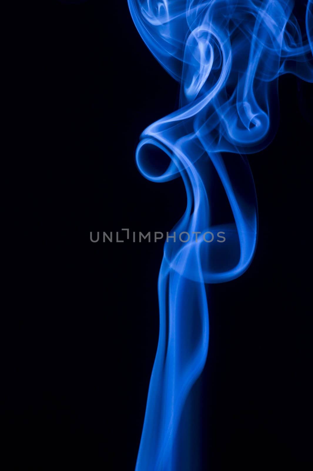 blue smoke over black background