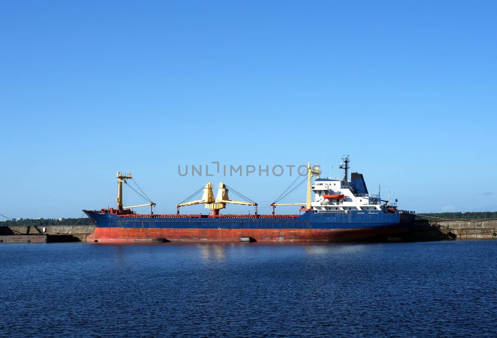 The cargo ship costs at a mooring