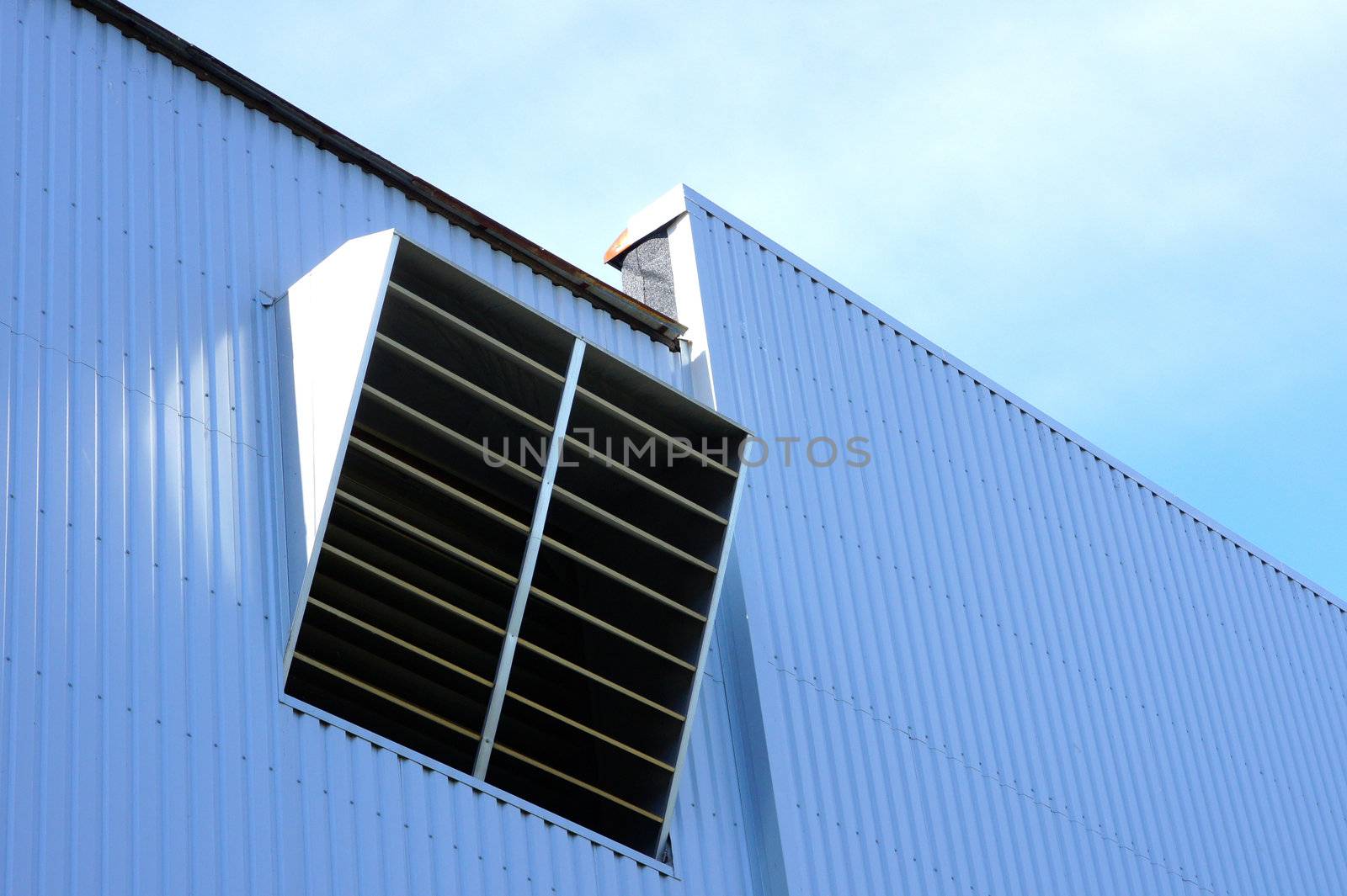 Ventilation on  a wall of an industrial building