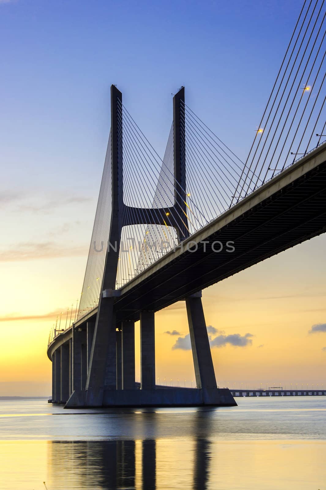 Vasco da Gama bridge in Lisbon, Portugal at sunrise