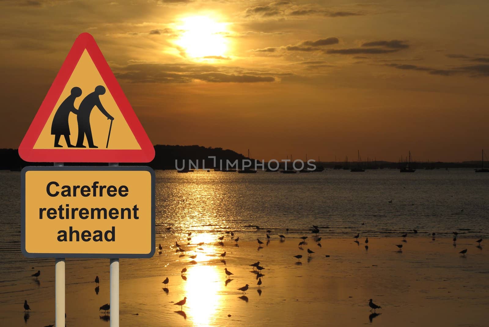 Carefree retirement ahead roadsign with sunset by acremead