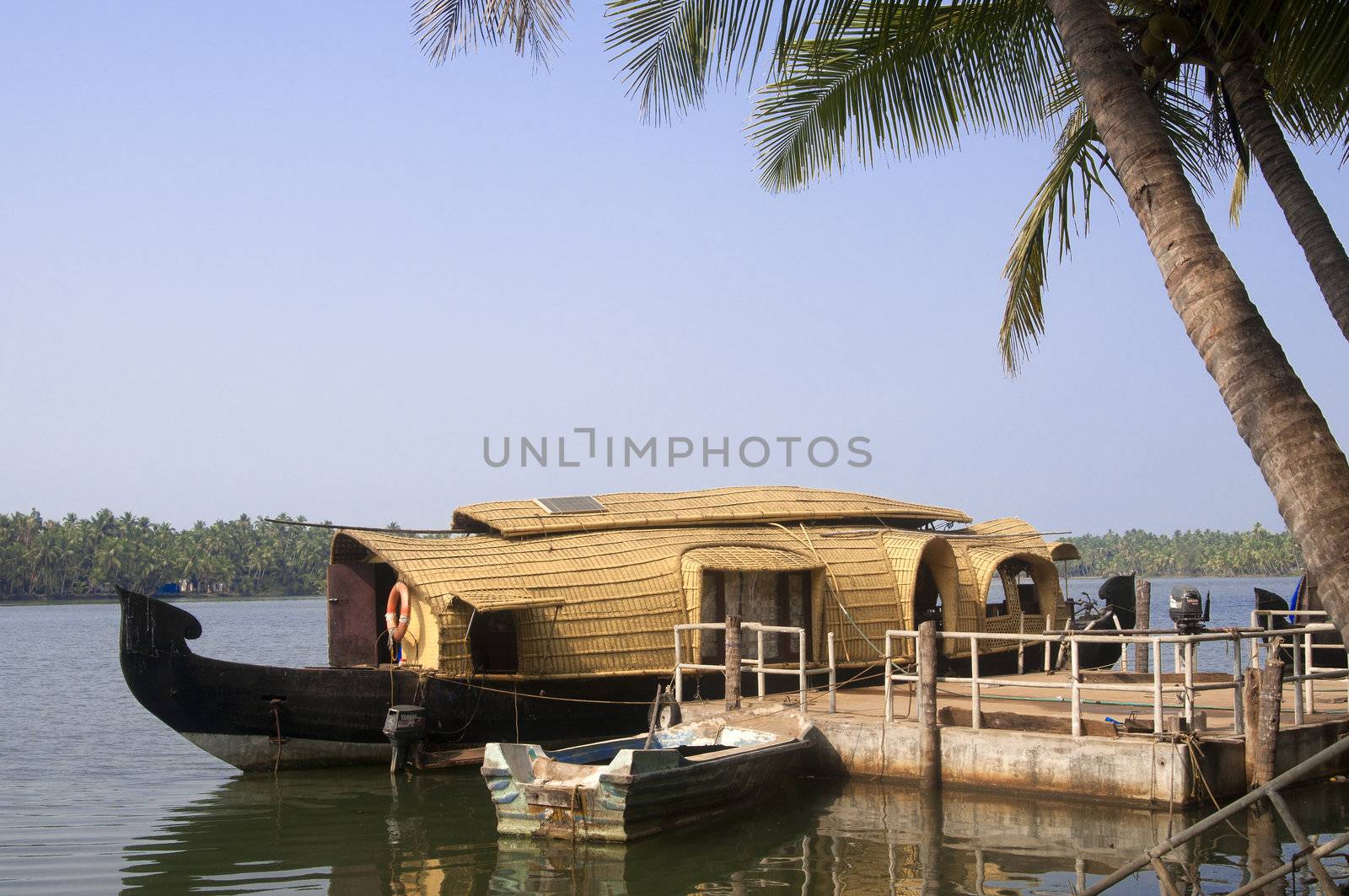 A houseboat  on the backwaters of Kerala, India  by johnnychaos