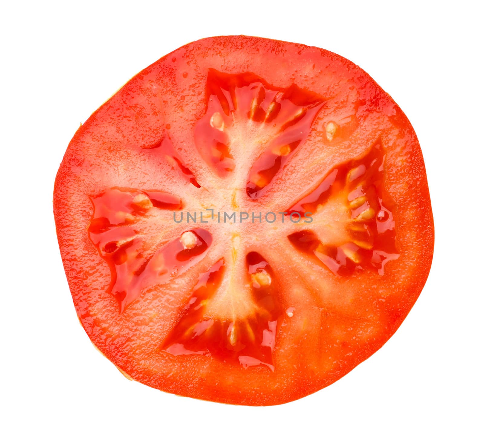 Closeup view of a section of tomato isolated on the white