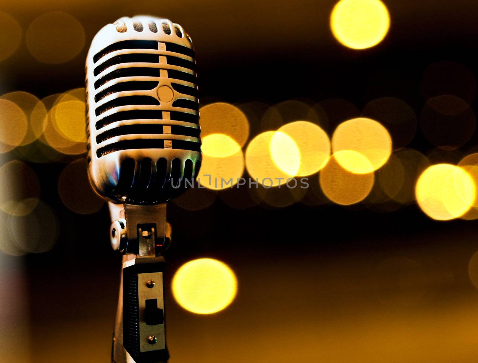 Musical background with microphone and stage lights