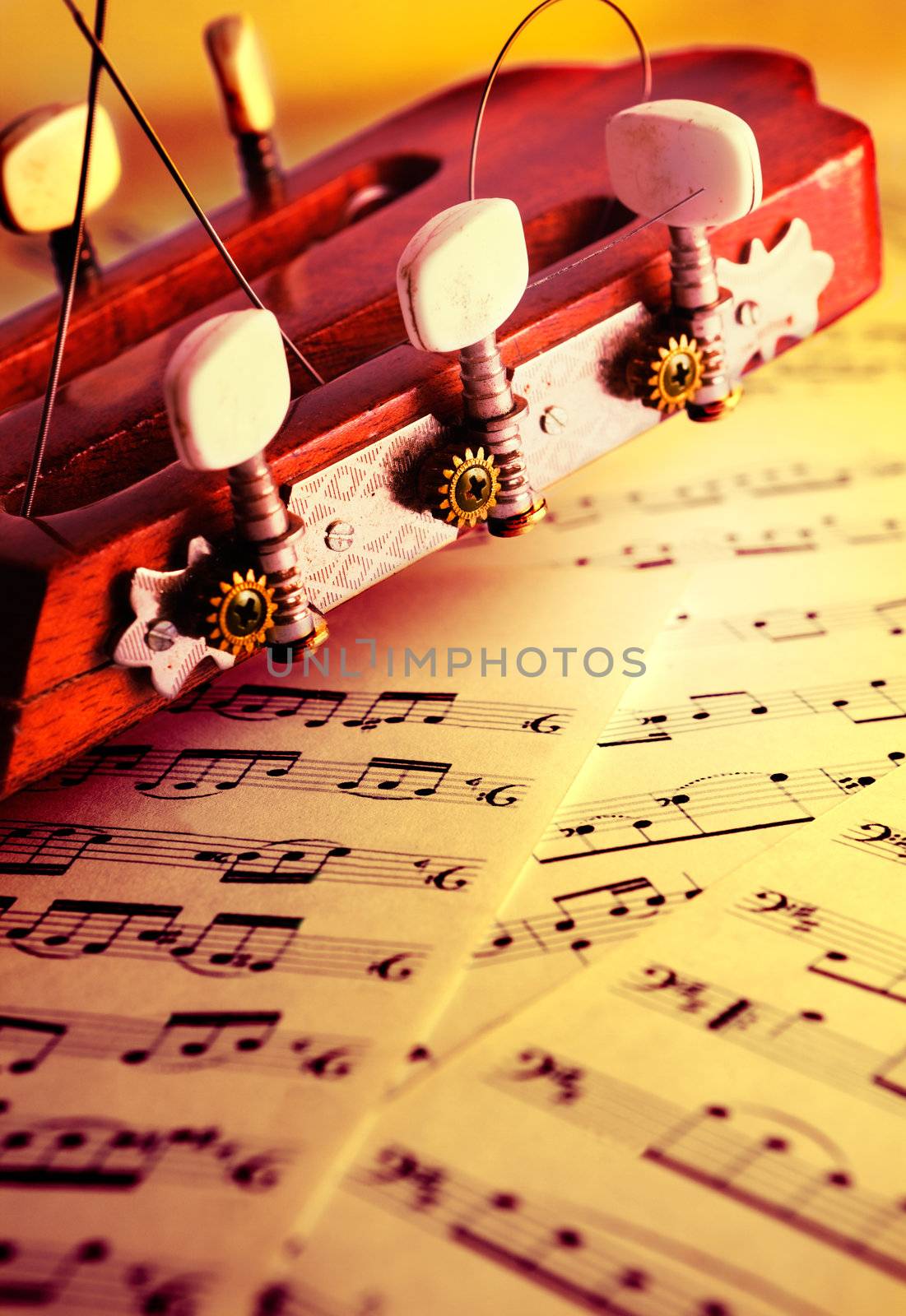 Classical musical background with acoustic guitar and music score