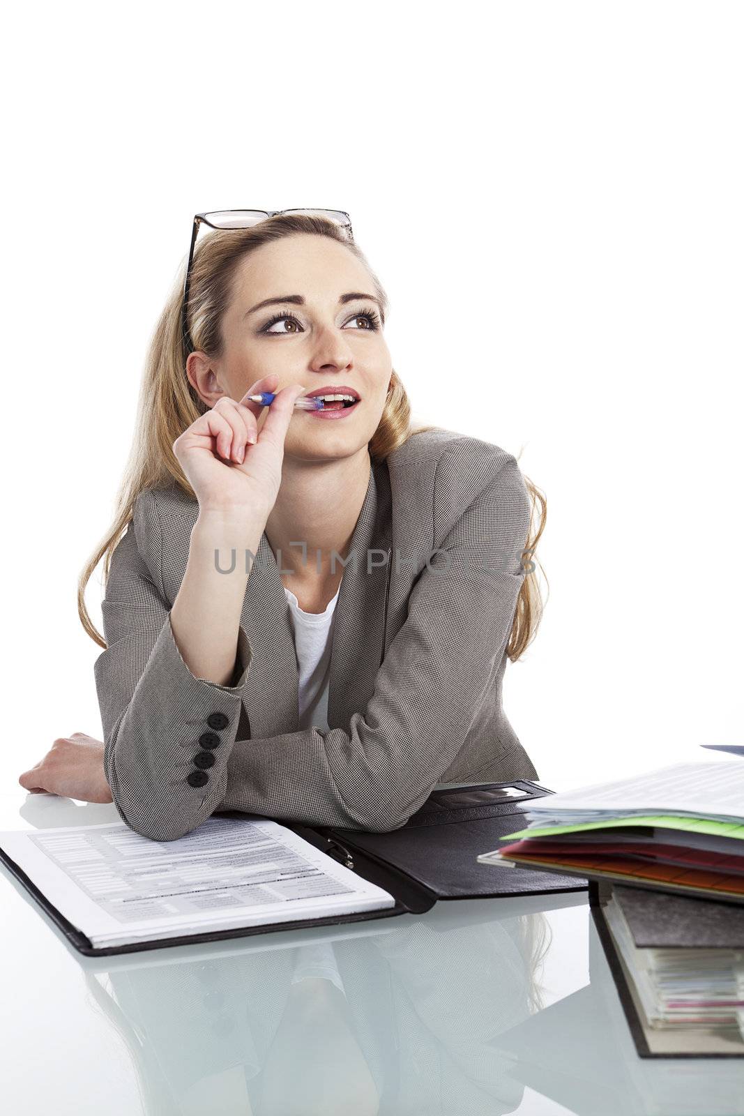 young successful business woman in the office with folder at work isolated on white background