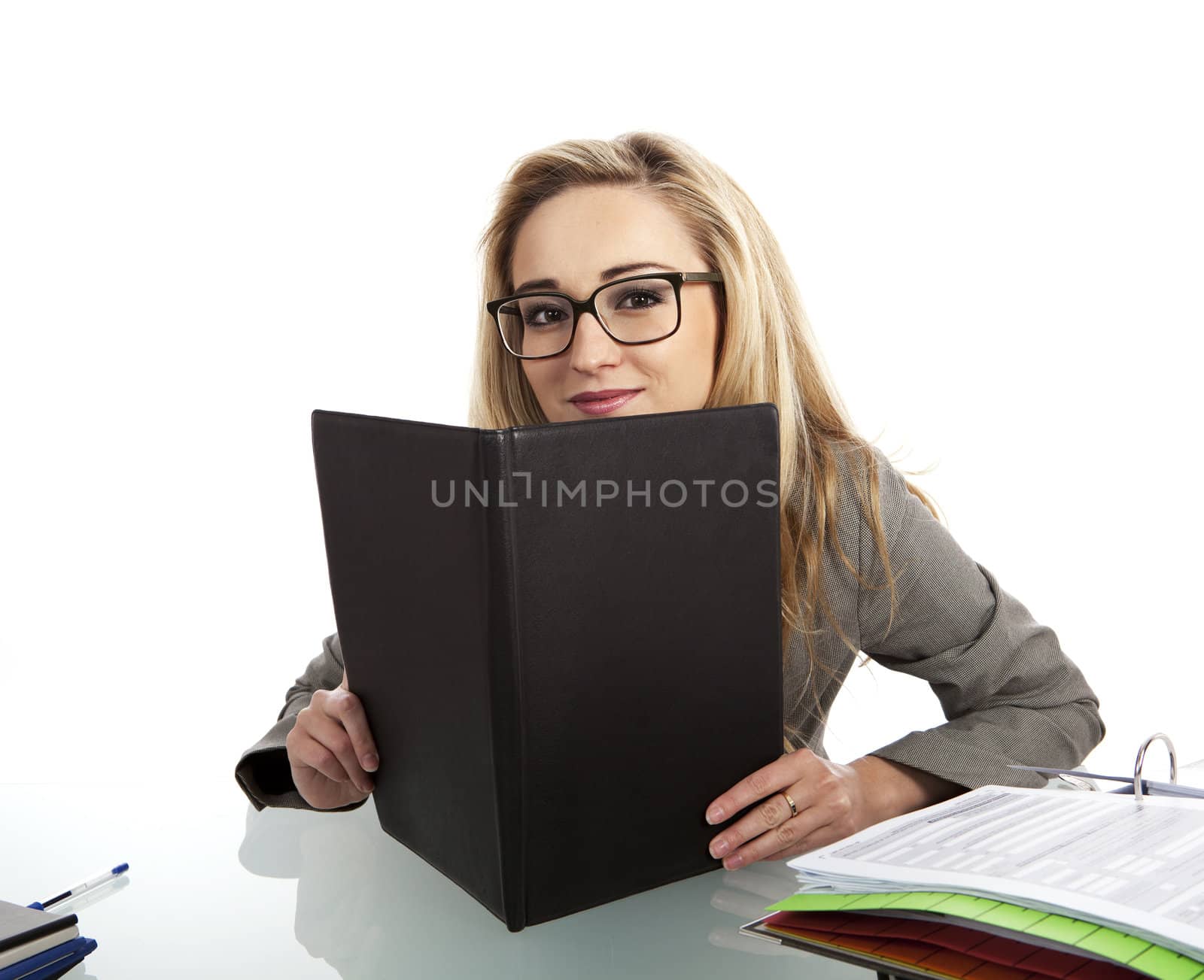 young successful business woman in the office with folder at work isolated on white background