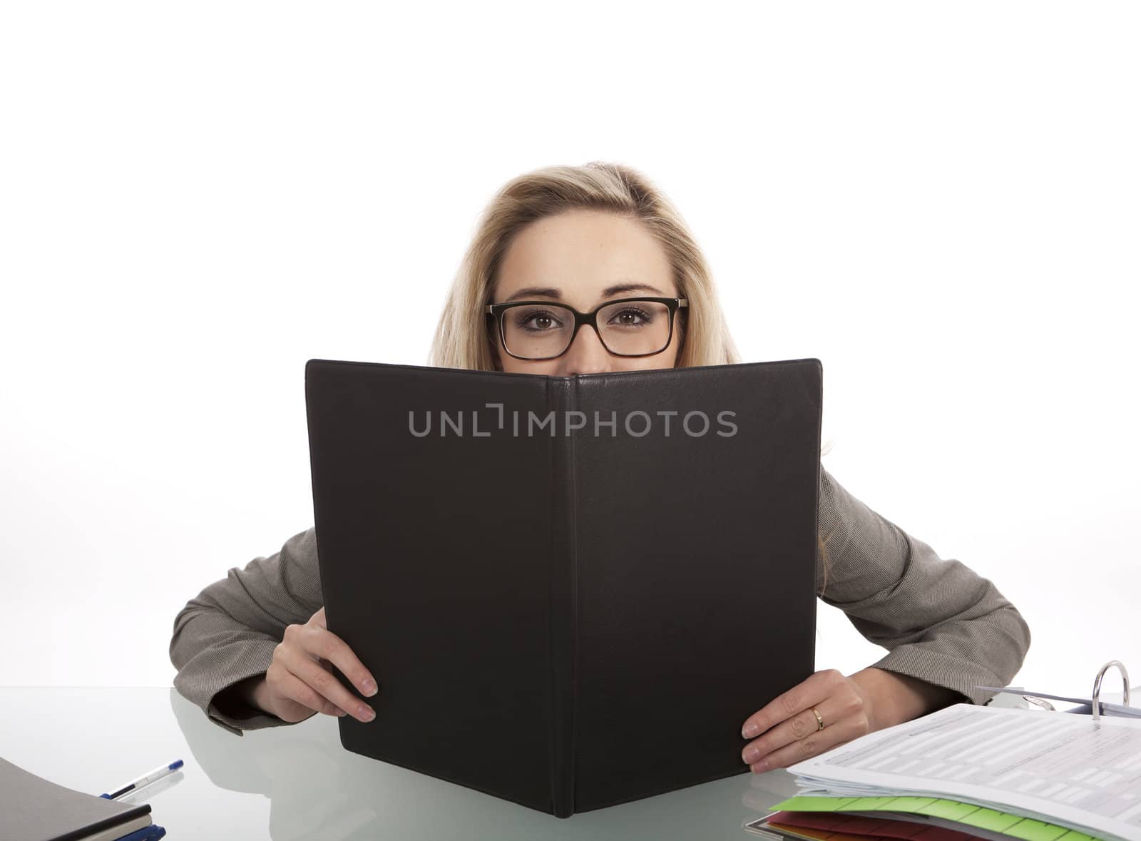 young successful business woman in the office with folder at work isolated on white background