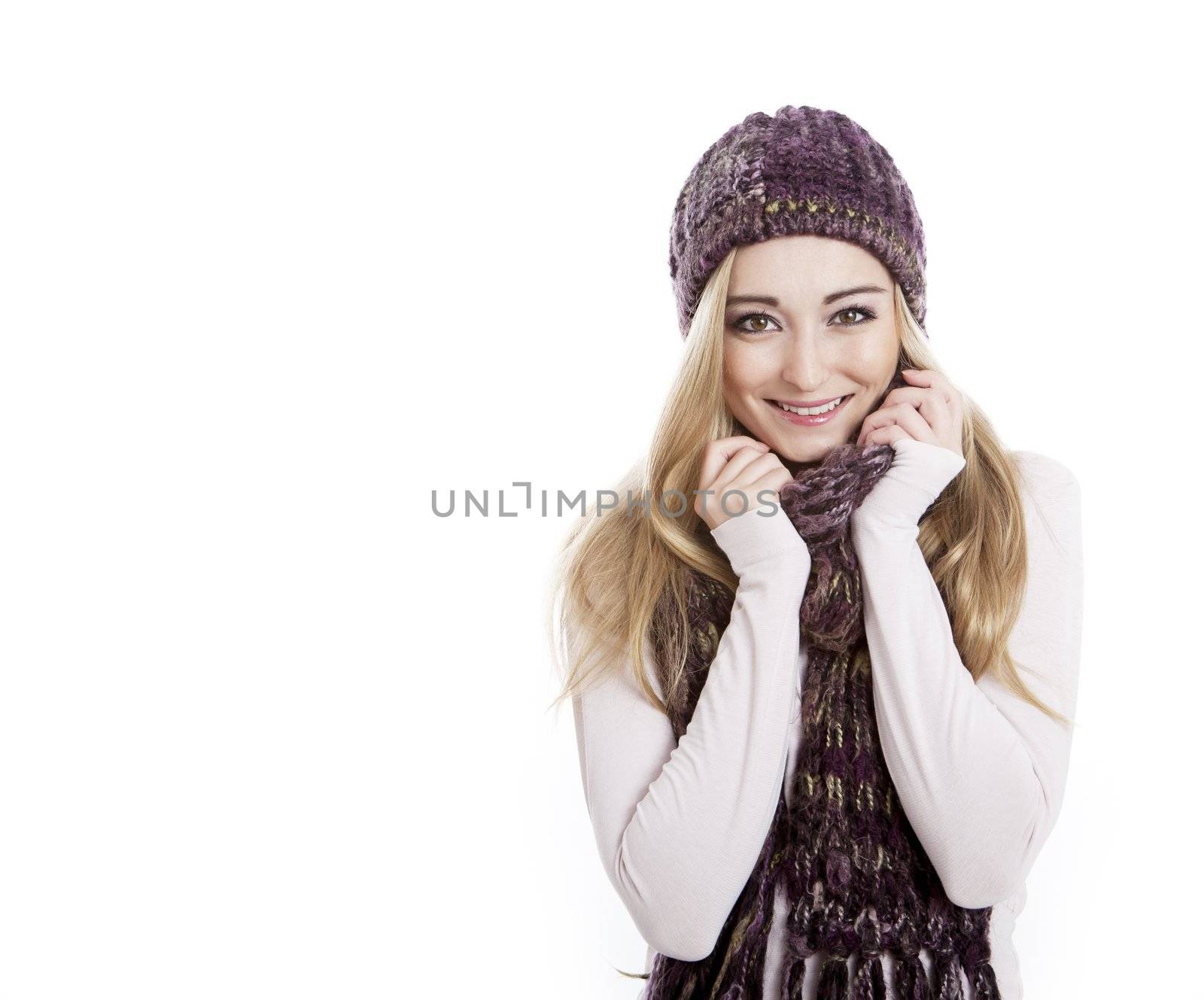 young beautiful woman with scarf and hat isolated 