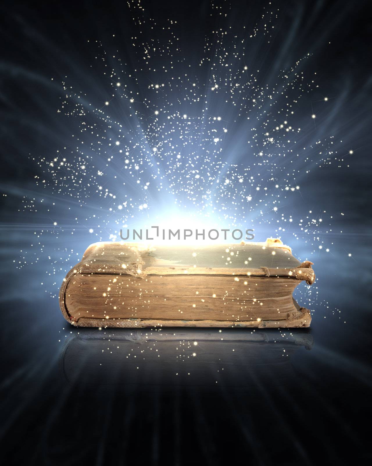 Magic book with light coming from inside it