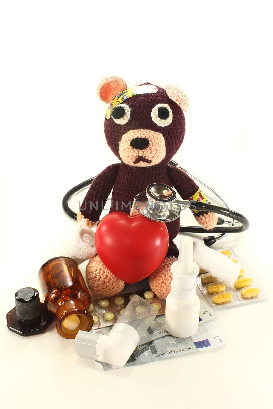Teddy Bear with various medications and stethoscope