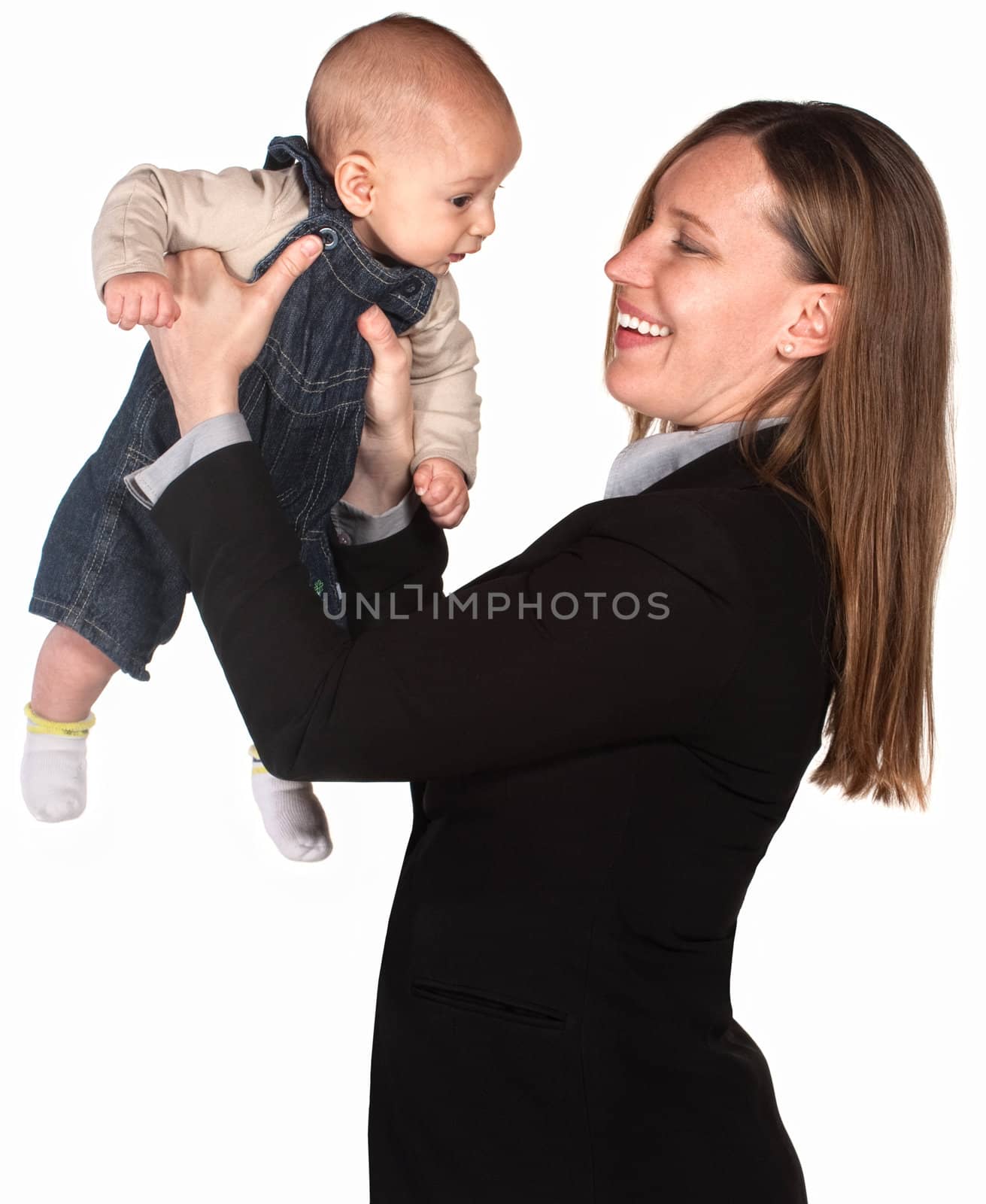 Pretty Hispanic female executive holding baby boy