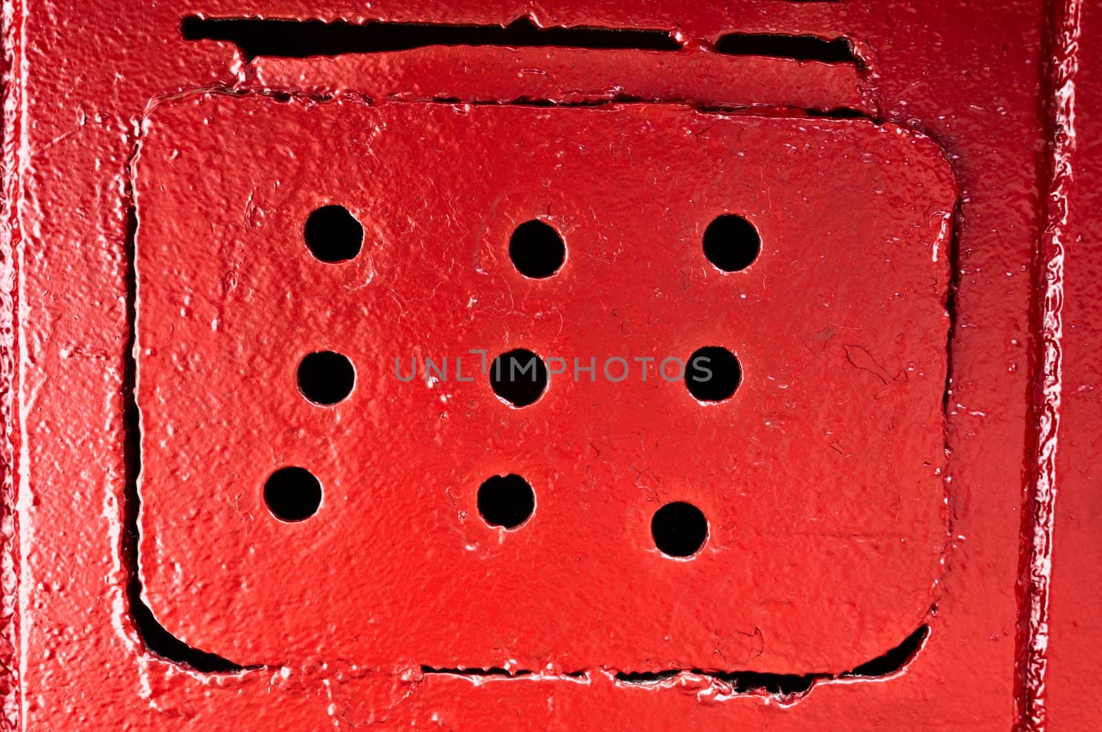 Red ventilating lattice with round holes