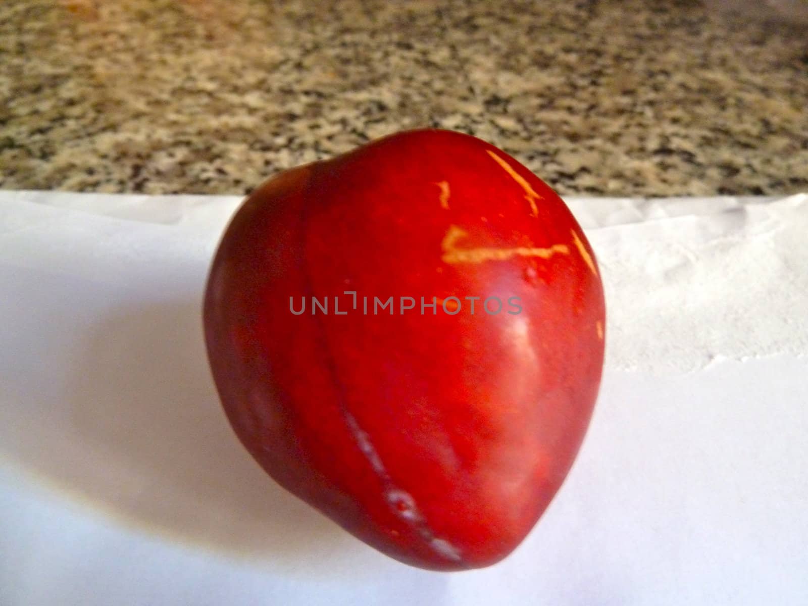 closeup of a fresh red plum