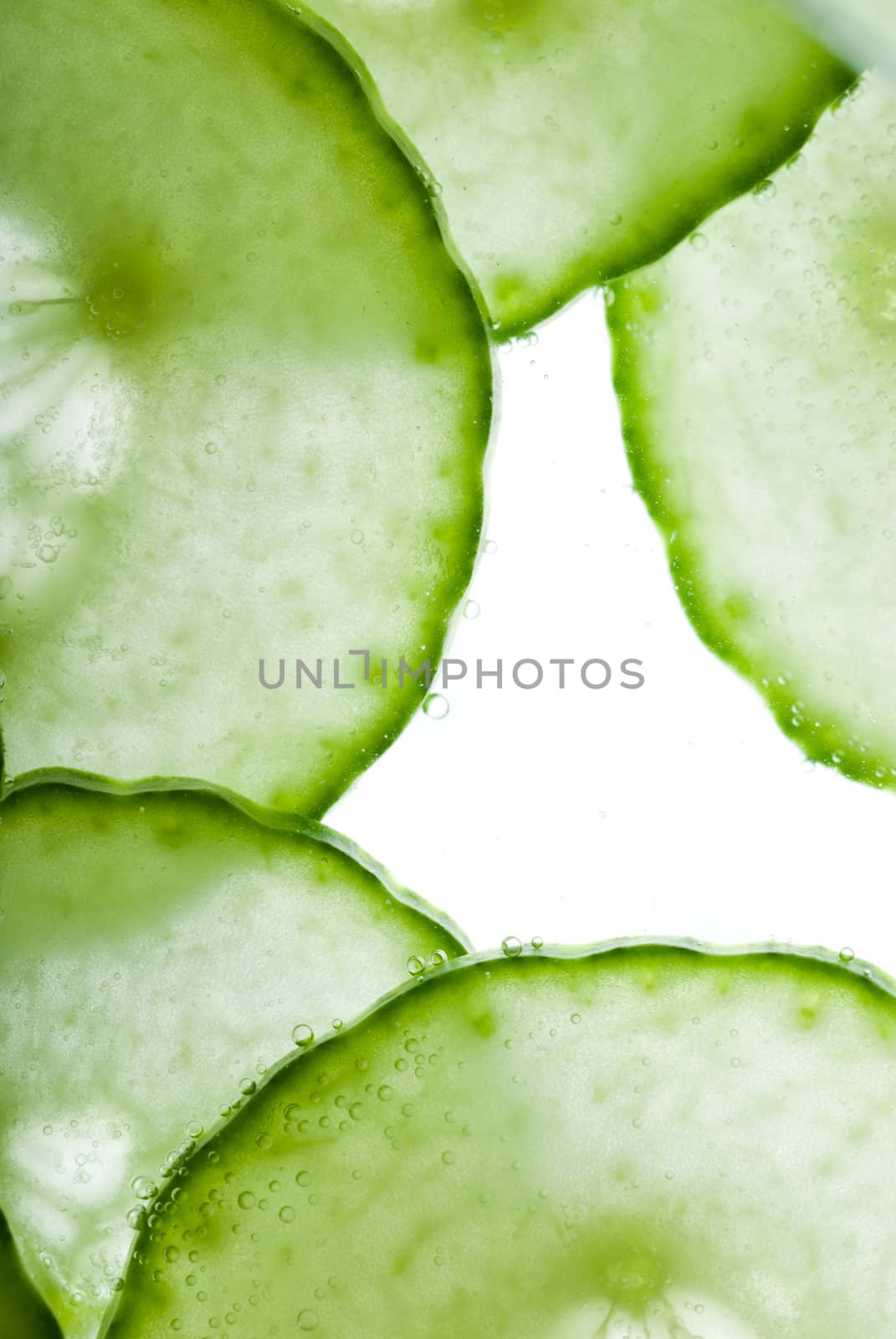 Slices of cucumber arranged in a frame