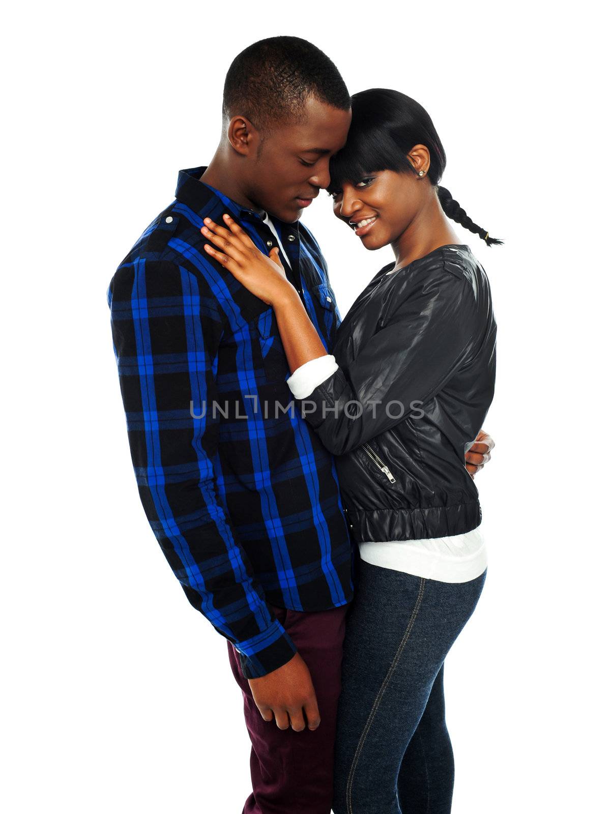 Attractive african couple posing together on white background