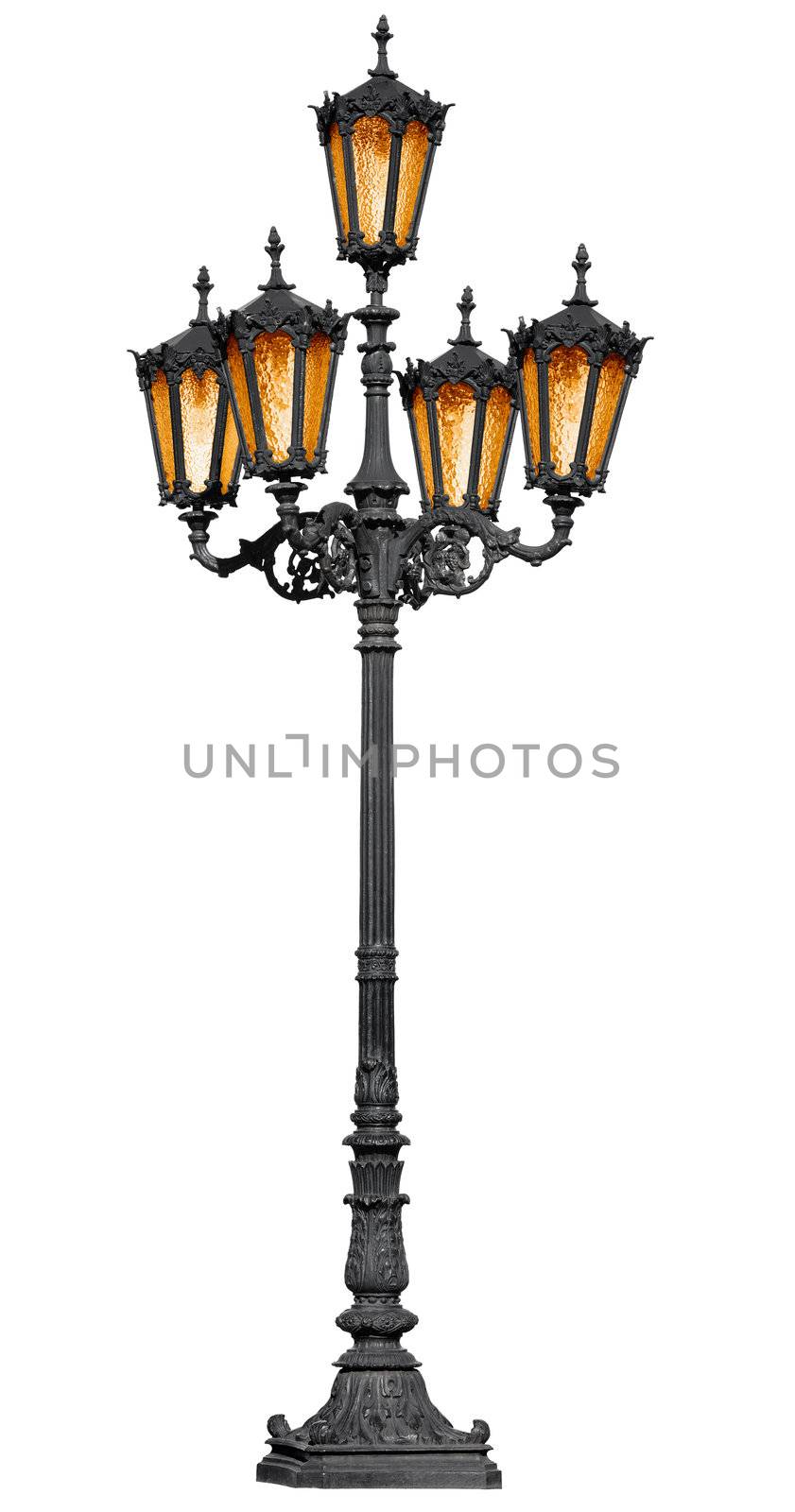 Antique cast iron lamp post isolated on white background