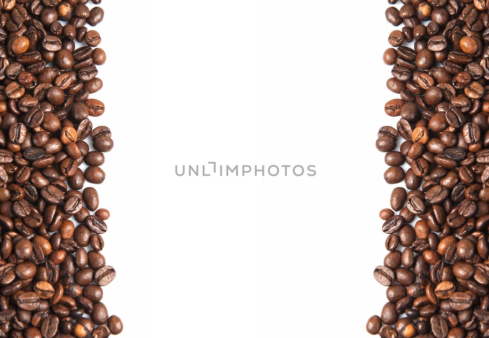 Coffee beans on a white background with a copy space.